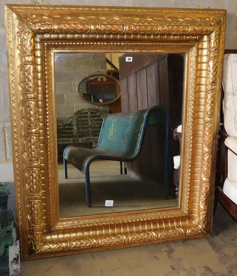 A Victorian carved giltwood picture frame wall mirror, with bevelled plate, W.110cm, H.130cm